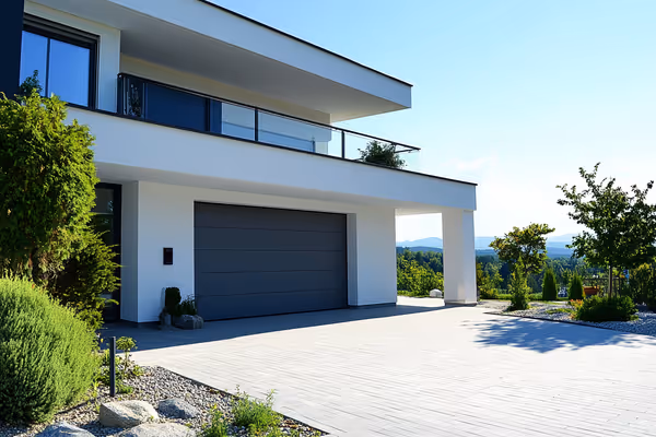 A modern garage door equipped with advanced smart locks, beautifully blending with contemporary architecture.